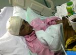 KVÆSTET. Det indonesiske torturoffer fotograferet i sin hospitalsseng i Medina i Saudi-Arabien. Arkivfoto. 