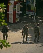 OPGØR. Ifølge Reuters er der igen her til morgen store kampe i Elfenbenskystens største by, Abidjan. Billedet viser uidentificerede soldater i byen. 