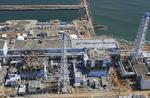 ATOMKRISE. Luftfoto afslører omfanget af skader på Fukushimas Reaktor 3 og Reaktor 4. 