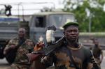 Kampe. Tilhængere af Alassane Ouattara er tæt på at trænge ind i Gbagbos præsidentpalads. 