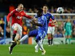 Centrum. Wayne Rooney (t.v.) lavede et flot mål på Stamford Bridge. 