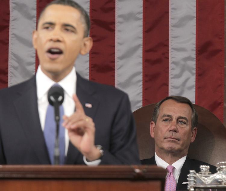 Konflikt. Den republikanske politiker John Boehner (i højre hjørne)kan tvinge demokraterne og Barack Obama til at lukke dele af den amerikanske offentlige sektor. 
