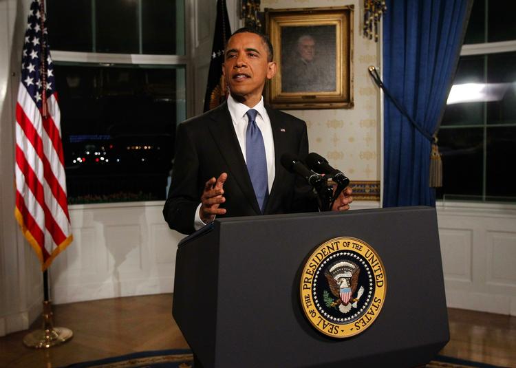 Lettet. Barack Obama undgik i sidste øjeblik et sviende nederlag, da budgettet blev stemt hjem. 