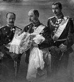 Fire generationer fotograferet umiddelbart efter Prins Frederiks dåb. Kong Chistian IX holder sit oldebarn Prins Frederik i armene. Til venstre Kronprins Frederik og til højre prins Christian. Året er 1899. 