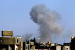 Eksplosion. Oprørere i Tripoli er gået over til guerillametoder i kampen mod Gaddafi. 