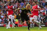 øv. Et straffespark af Dirk Kuyt laaangt inde i overtiden kostede endnu en gang Arsenal en sejr. 