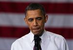 Anklager. Barack Obama må findes sig i, at hans personlige baggrund igen og igen er årsag til angreb og mistænkeliggørelse. 
