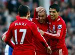 hattrick. Maxi Rodriguez blev måske nok den største målscorer for Liverpool i dag, men Luis Suarez (th) var involveret i næsten alle farlige offensive aktioner for Liverpool-holdet. 