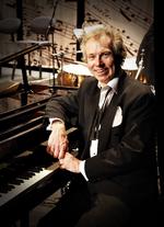 Institution. Henrik Krogsgaard er en kapelmester med menneskeligt gehør - og humør. 