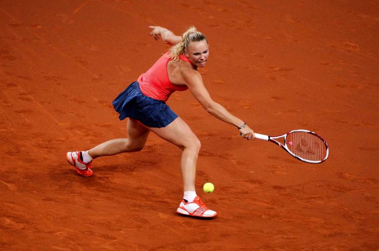 overlege. På 68 minutter vandt Caroline Wozniacki for fjerde gang i lige så mange kampe over japaneren Ayumi Morita. 