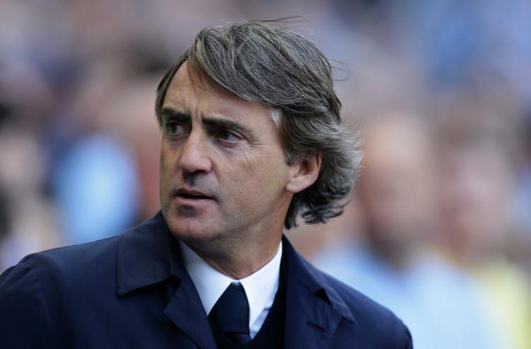 godkendt? Roberto Mancini har været under pres fra begyndelsen af sæsonen. Træneren har endnu ikke fået det stjernespækkede Manchester City-mandskab til at fungere problemfrit, men en fjerdeplads og en pokalfinale letter presset. 