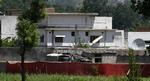 Dødsbo. Pakistanske soldater holder vagt ved, hvad der menes at være, det hus, hvor Osama bin Laden holdt sig skjult i Pakistan, og hvor han blev dræbt i går af amerikanske soldater. 