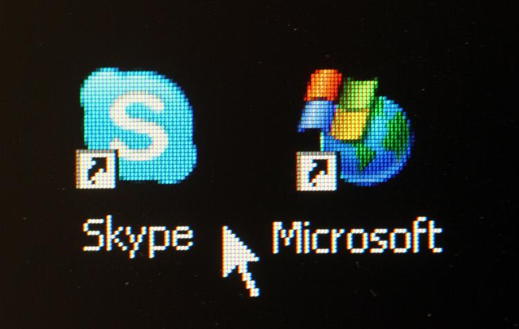 Opkøb. En computerskærm i den tyske by Schwerin affotograferet tidligere i dag, hvor rygterne om Microsofts hidtil største handel begyndte. 