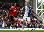 Rystet. Blackburns Brett Emerton var med sin scoring tæt på at udsætte Manchester Uniteds mesterskabsfest. 