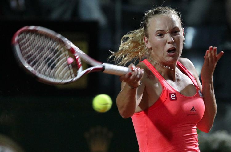 Vinder. Caroline Wozniacki er klar til at spille sig i tredje runde af WTA-turneringen i Rom. 