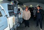 Visit. Det er lykkedes Kim Jong Il at holde sit besøg i Kina hemmeligt i fire dage. Dette udaterede billede udsendt af Nordkoreas statslige nyhedsbureau fra et besøg på en af Nordkoreas egne virksomheder. 