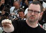 Director Von Trier poses during a photocall for the film Melancholia at the 64th Cannes Film Festival