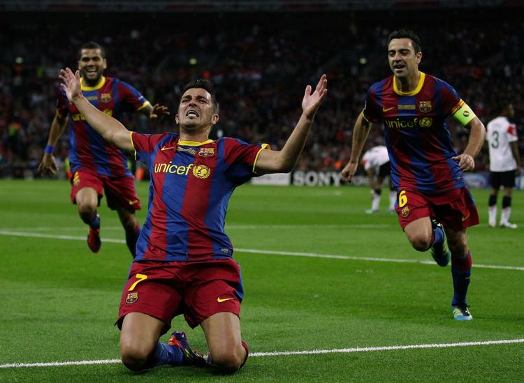 Afgørelse. David Villa bryder ud i jubel efter sin scoring til 3-1. 