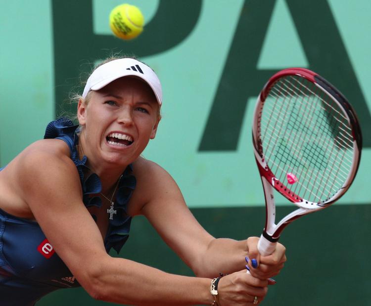 hjemmebane. Caroline Wozniacki skuffede sig selv og de danske forventninger, da hun ikke kom længere end til tredje runde i French Open. Men nu har hun mulighed for samlet sejr i WTA-turneringen i Farum. 