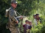 Turkish activists say Turkish soldiers have helped by cutting border fences. 