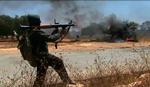 Oprør. Kilder fortæller BBC, at der smugles våben ind til de libyske oprørere fra Tunesien. 