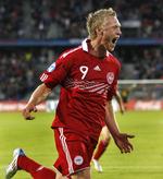 Glad. Nicolai Jørgensen jubler efter at have scoret Danmarks mål til 2-1 over Hviderusland. 
