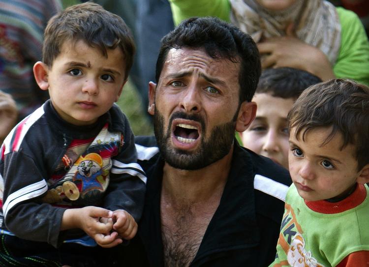 Flugt. Tusindvis af syrere er flygtet over grænsen til Tyrkiet. Mange har berettet om drab og arrestationer udført af syriske sikkerhedsstyrker med hjælp fra iranske militsfolk. 