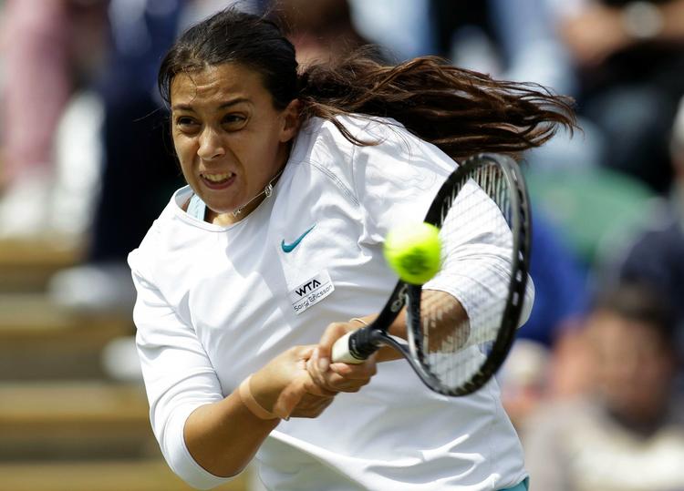 dobbelt-kamp. Marion Bartoli fra Frankrig har spillet sig i storform på græsset inden Wimbledon. I dag vandt hun turneringen i Eastbourne. 