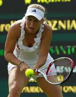 Vinder. Efter en times spil sammenlagt var Wozniacki videre i turneringen. 
