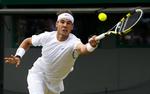 videre. Rafael Nadal havde igen besvær med Gilles Müller på Wimbledons græs. 