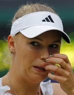 guld. Caroline Wozniacki havde fået ny farve på neglene til dagens opgør mod hårdtslående australier. 