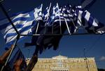 Krise. Grækenland er tæt på at gå fallit, men for gadesælgerne i Athen er der stadig en skilling at tjene på at sælge flag og souvenirs. 