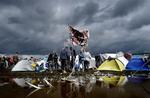 Ingen fest uden gummistøvler, hvis festivalen bliver så våd som i 2002. 