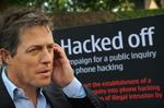 AFLYTTET. Hugh Grant er selv blevet forfulgt af den britiske sladderavis News of The World, der er endt i en mediestorm efter aflytninger af drabsofres pårørende, soldaterenker og kriminalefterforskere. 