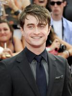 Daniel Radcliffe smiler stolt til kameraet i New York. 