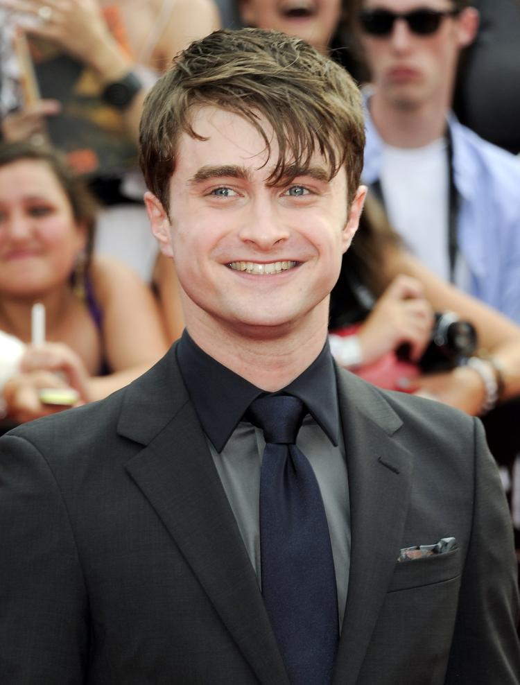 Daniel Radcliffe smiler stolt til kameraet i New York. 