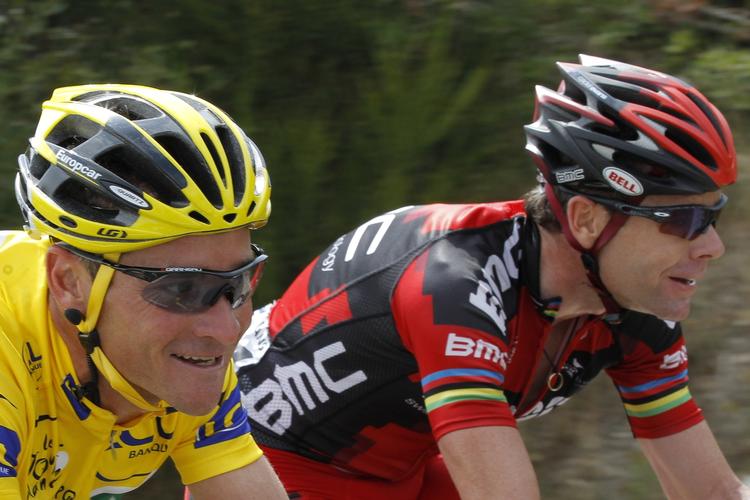 Skiftedag? Årets første alvorlig møde med bjergene kan sende Cadel Evans (t.h.) i gult. 