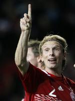 transfer? Siden skiftet fra FCK til tyske Schalke i 2002 har Poulsen spillet i Sevilla, Juventus og Liverpool. 