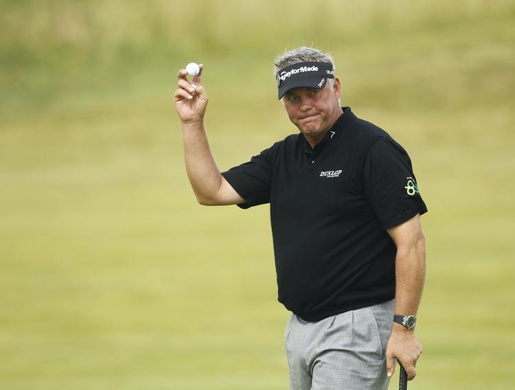 Vinder. »Min fejring bliver meget, meget lang, og jeg får nogle ekstreme tømmermænd«, siger Darren Clarke. 