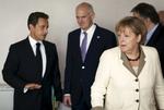 Tysklands kansler Angela Merkel sammen med Frankrigs præsident Sarkozy (tv.) og Grækenlands Giorgos Papandreou. 