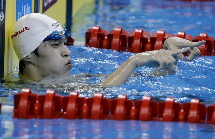 verdensrekord. Med et halvt sekunds marginal satte kineseren Sun Yang den anden verdensrekord ved VM i Shanghai. 