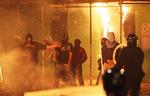 Demonstranterne var på gaden i protest mod, at en 29-årig far til fire havde mistet livet som følge af en skudveksling med politiet. 