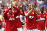 forståligt. Klubkammeraterne Wayne Rooney (t.v.) og Rio Ferdinand (i baggrunden) er enige i, at onsdagens landskamp mod Holland skulle aflyses. 