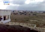 ANGREB. Amatørvideo viser angiveligt kolonner af militærkøretøjer nær Latakia. 