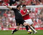 Bytte. Hvis Cesc Fabregas (t.h.) skifter Arsenals trøje ud med Barcelonas. 