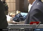 Anklaget. Den 83-årige Hosni Mubarak bliver rullet ind i bygningen, hvor retssagen mod ham foregår. 