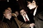 A happy Hüseyin Arac (centre) says his Ramadan reception in Parliament is to go ahead. Archive. 