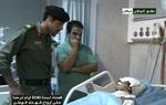 militærmand. Dette billede fra 10. august viser Khamis Gaddafi (tv.) på et hospital i Tripoli, hvor han besøger en såret soldat. 