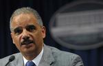 efterforskning. Den amerikanske justitsminister Eric Holder forsikrer, at hans ministerium er i gang med en grundig efterforskning af, hvorvidt ofre og efterladte for terrorangrebet i 2001 er blevet hacket og aflyttet af den skandaleramte nu lukkede avis News Of The World. 
