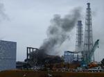 ATOMKATASTROFE. Røg ses stige op fra Fukushimaværket i marts, kort efter at en tsunami ødelagde dele af værket og dermed forårsagede eksplosioner, ildebrande og radioaktivt udslip fra reaktorerne. 